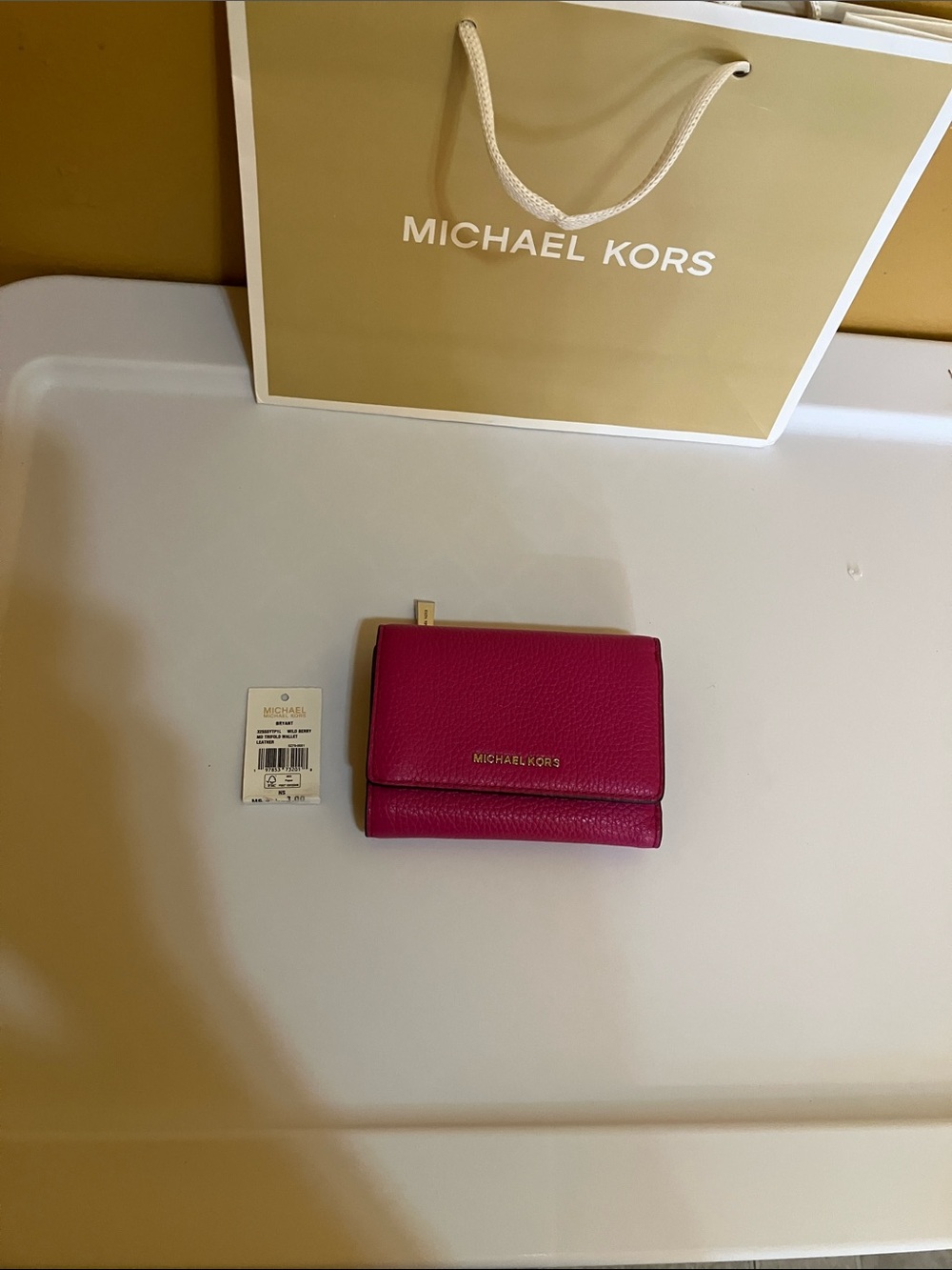 Michael Kors  Bryant Wildberry Pebbled Leather Trifold Wallet